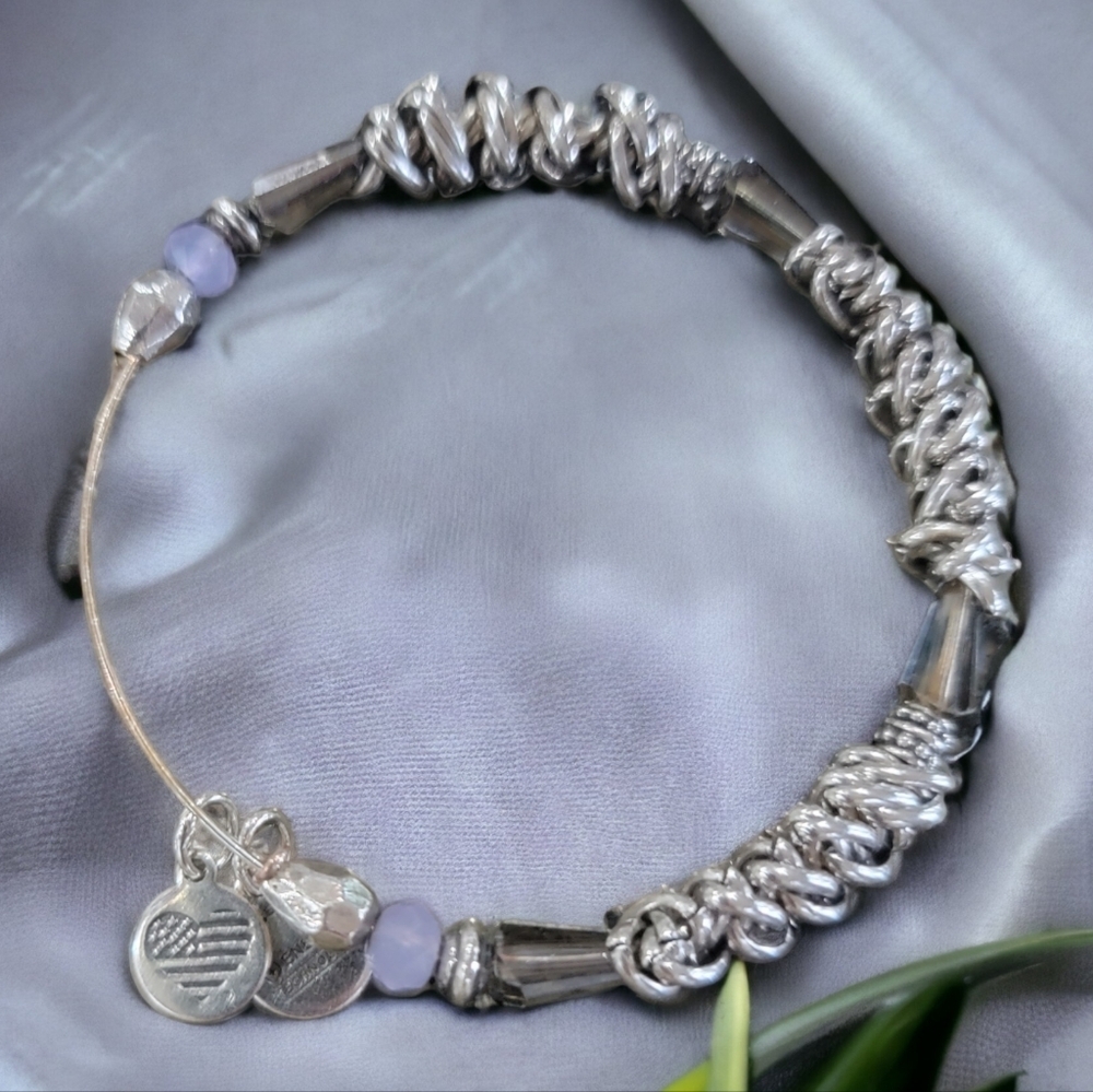 Silver bracelet with purple accent